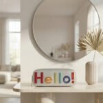 "Hello!" Graphic Metallic Pouch-Silver with Multicolored Lettering